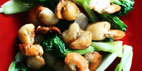 Lighthouse Gin scallops with baby bok choy. Photo / Doug Sherring