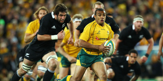 Will Genia (right) of the Wallabies in action last night. Photo / Getty Images