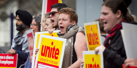 Unite supporters protest outside Burger King at Aotea Square yesterday. They say staff of the fast-food chain are pressured not to join the union. Photo / Natalie Slade