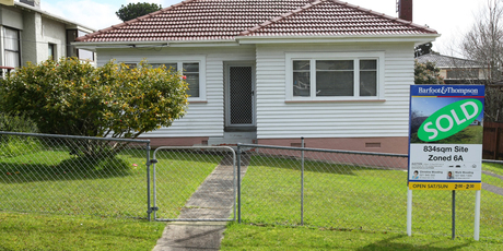 This two-bedroom house on more than 800sq m of land at 23 Watea Rd, Sandringham, was valued at $720,000 but fetched $1.1 million at auction. Photo / Chris Gorman