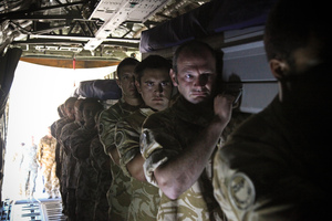 Members of the NZ Provincial Reconstruction Team carry the caskets of their three fallen comrades across Bagram Air Base in Afghanistan. Photo / NZDF