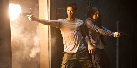 Colin Farrell and Jessica Biel go in all guns blazing in Total Recall.
