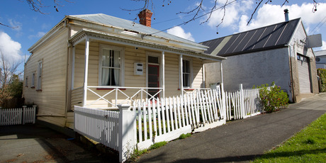 A do-up villa on 480sq m at 39 Millais St, Grey Lynn, sold for $1.006 million in June. Photo / Steven McNicholl