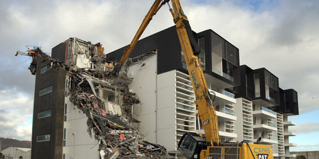 Demolition of the earthquake damaged Water's Edge Apartments on Tidal View Road, Ferrymead. Photo / File