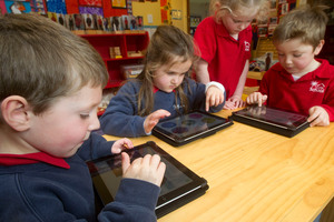 Four-year-olds (from left) Harry Ward, Alice Egerton, Emma Dickson and Ted Henderson all use iPads at the Kelburn Little School in Wellington. Photo / Marty Melville