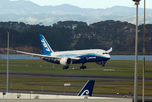 The Boeing 787 Dreamliner lands at Auckland International Airport. Qantas, rocked by a $245m annual loss, says it is cancelling its order for 35 of the new planes. Photo / Steve McNicholl