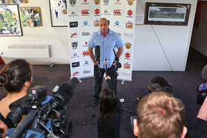 Brian McClennan talks to the media after being sacked by the Warriors. Photo / Getty Images