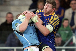 Adam Thomson of Otago and Cam Goodhue of Northland compete for the ball . Photo / Getty Images