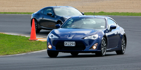 A low-slung profile and wide rear gives Toyota's sports coupe 86 a dynamic look and as rally champion Neal Bates says: "it's the most fun you can have without losing your licence".