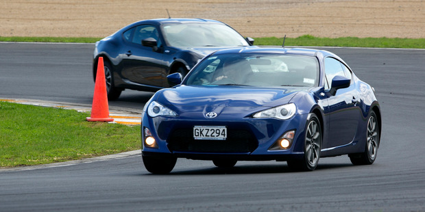 A low-slung profile and wide rear gives Toyota's sports coupe 86 a dynamic look and as rally champion Neal Bates says: "it's the most fun you can have without losing your licence".