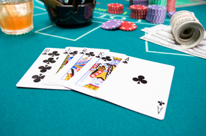 The chance of being dealt a royal flush is 650,000 to one. Photo / Thiinkstock