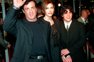 A 1996 file photo showing Sylvester Stallone, with his then girlfriend Jennifer Flavin,and his son Sage. Photo / AP