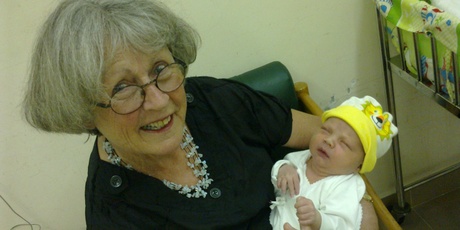 Julie Ferne holding her grandson Carter. Photo / supplied