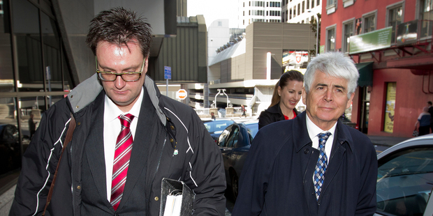 Defence lawyer Greg King (left) and his client Barry Hart leaving the Auckland District Court building, where the disciplinary tribunal hearing was held. Photo / Sarah Ivey
