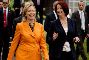 Hillary Clinton (left) and Julia Gillard will be aiming to help the cause of their female counterparts. Photo / AP