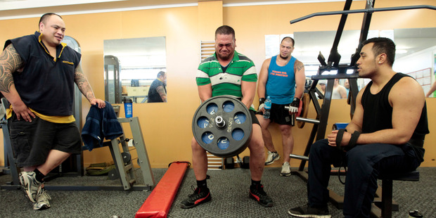 Peni Tavalu gives his all in Foodstuffs' gym. Photo / Michael Craig