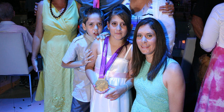 Jo Aleh with siblings Yaam, left, and Shefa Shukrun, in Israel. Photo / Supplied