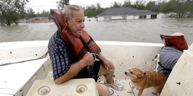 As New Orleans folk fled, Republicans cheered Mitt Romney's nomination. Photo / AP