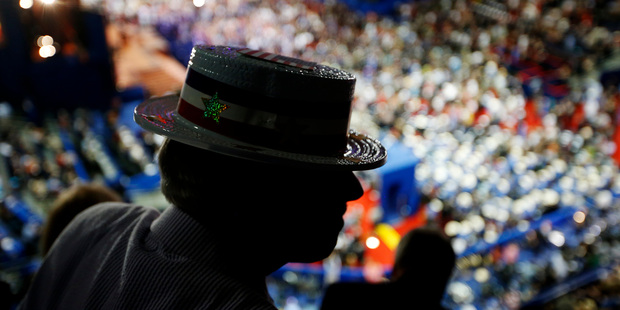 North Carolina delegate Steve Malay dons his hat at the Republican National Convention. Photo / AP