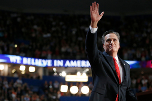Republican presidential nominee Mitt Romney waves to delegates after his speech, which was aimed at letting Americans know him better. Photo / AP