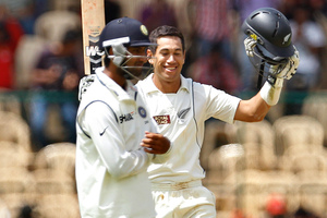 New Zealand captain Ross Taylor (right) celebrates scoring a century . Photo / AP