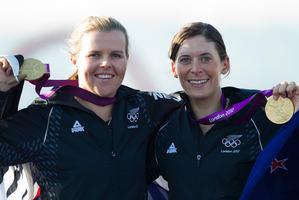 Olivia Powrie (left) and Jo Aleh picked up gold in the 470 dinghy sailing class. Photo / Mark Mitchell