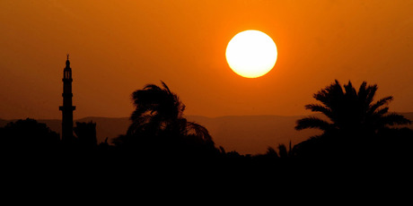 The sun sets over the Nile. Photo / Alan Gibson