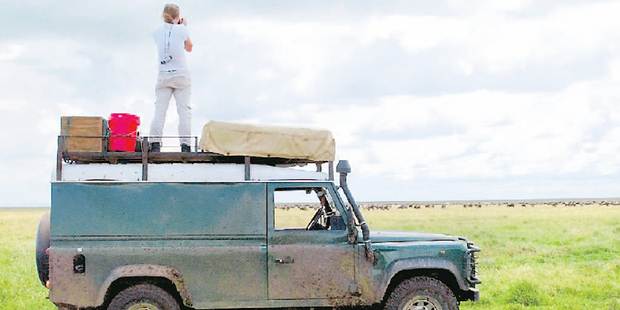 Debbie Simpson checks out herds migrating across the Serengeti. Photo / Peter Simpson