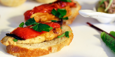 Grilled haloumi and roasted peppers on crostini. Photo / Michael Craig