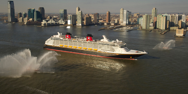The Disney Fantasy cruise liner sails past the Manhattan skyline en route to its new home port at Port Canaveral in Florida. Photo / Creative Commons image by Flickr user insidethemagic