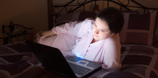 Reading from a backlit screen just before turning in for the night may affect quality of sleep, a study suggests. Photo / Thinkstock