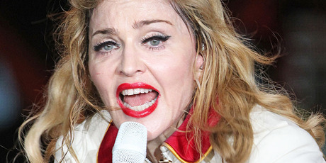 Madonna has apologised for not bringing her MDNA tour Down Under. Photo / AP