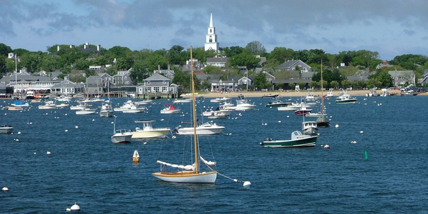 Boats bob in Nantucket Harbour, with its backdrop of genteel houses clad in grey slatted cedar tiles. Photo / Thinkstock