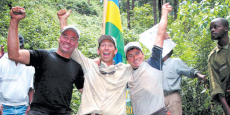 Kiwis Garth MacIntyre (L), Cam McLeay (R) and Briton Neil McGrigor (C) near the newly-found source of the Nile River in Rwanda. Photo / Reuters