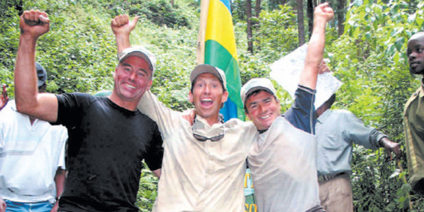 Kiwis Garth MacIntyre (L), Cam McLeay (R) and Briton Neil McGrigor (C) near the newly-found source of the Nile River in Rwanda. Photo / Reuters