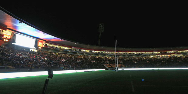 Westpac Stadium is enveloped in darkness during the halftime power failure. Photo / Getty Images