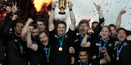 All Blacks captain Richie McCaw holds aloft the Webb Ellis Cup, after the team won the Rugby World Cup final match between New Zealand and France. Photo / Brett Phibbs