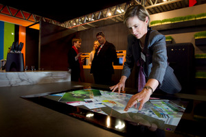 Smeg managing director Rachel Louie demonstrates the Samsung table tablet where you can surf the net or browse through recipes while cutting vegetables. Photo / Natalie Slade
