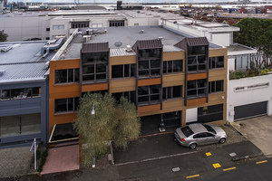 This office building at 24 York St in Parnell comprises two levels of office space and parking on the ground floor. It is being offered for sale by tender.