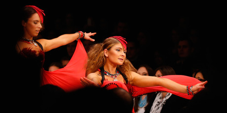 Dancers showcase Kagi's jewellery. Photo / Getty Images