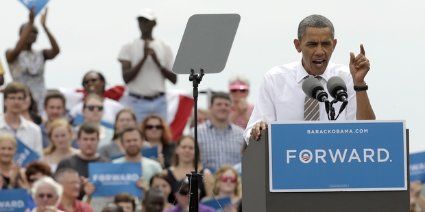 In 2008 Barack Obama had no trouble getting people to go to the ballot box during his historic election win. But in 2012, it's a different game. Photo / AP