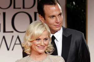 Amy Poehler, left, and Will Arnett arrive at the 69th Annual Golden Globe Awards in Los Angeles. File Photo / AP