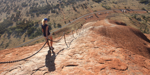 It's a long - and very steep - climb up and down Uluru. Photo / Colin Espiner