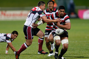Fritz Lee of Counties Manukau drops the ball as he is tackled by Cory Aporo of North Harbour. Photo / Getty Images
