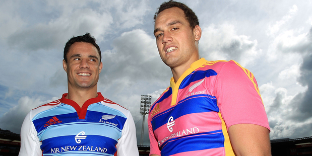 Dan Carter and Israel Dagg show of the training strips they designed using adidas' online customisation tool. Photo / Getty Images