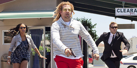 Joy Bryant, Bradley Cooper and Ryan Hansen in a scene from the film Hit and Run. Photo / AP