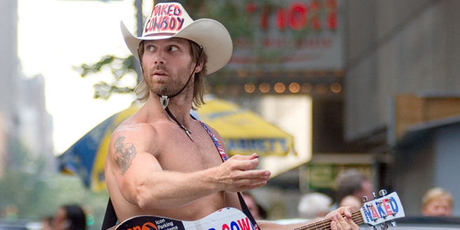 Times Square's Naked Cowboy, Robert Burck, has been entertaining tourists in New York for 13 years - but now he's facing some competition from a man calling himself the Naked Indian. Photo / Creative Commons image by Wikimedia user Ryan McGinnis