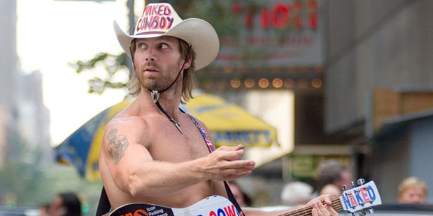 Times Square's Naked Cowboy, Robert Burck, has been entertaining tourists in New York for 13 years - but now he's facing some competition from a man calling himself the Naked Indian. Photo / Creative Commons image by Wikimedia user Ryan McGinnis