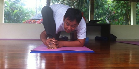 Chintamani Bali Retreat and Spa's yoga guru Budhi mid-stretch. Photo / Kristin Edge