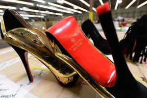 Christian Louboutin has won the right to trademark its red soled shoes.
Photo / AFP